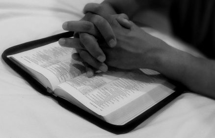 Prayer hands and the Bible